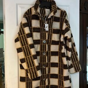 Modern plaid, cream black and tan woolly hip length jacket.
